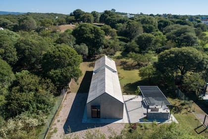 Vista aérea de la casa y su ubicación en el lote.