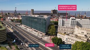 Vista de Distrito Quartier desde la Avenida Antártida Argentina. En los pisos 8° y 9° del ex Hospital Ferroviario (el edificio blanco detrás de la Casa de Moneda) se llevará a cabo Experiencia Living.