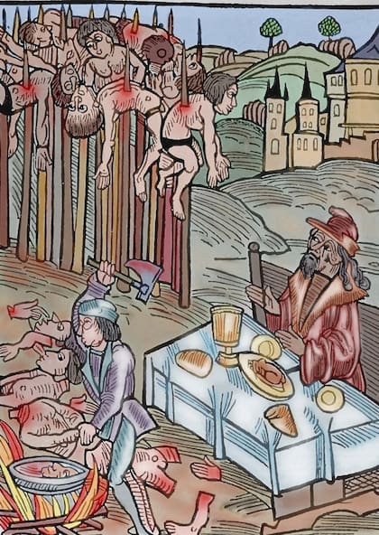 Vlad el Empalador almorzando mientras observa a sus víctimas, en grabado germánico de 1560 coloreado