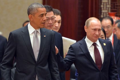 Obama y Putin durante una cumbre de la APEC
