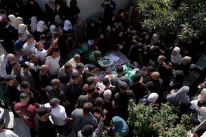 WEST BANK - OCTOBER 04: (EDITORS NOTE: Image depicts death) People attend a funeral ceremony for the Palestinians lost lives in an Israeli airstrike on a cafe in the Tulkarm Refugee Camp, West Bank on October 04, 2024. (Photo by Issam Rimawi/Anadolu via Getty Images)