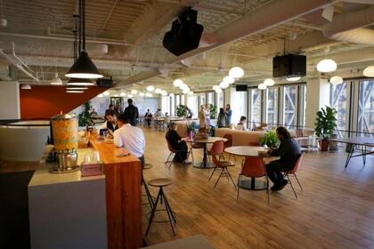WeWork se desarrolló en las principales ciudades del mundo con su modelo de alquiler temporario de oficinas 