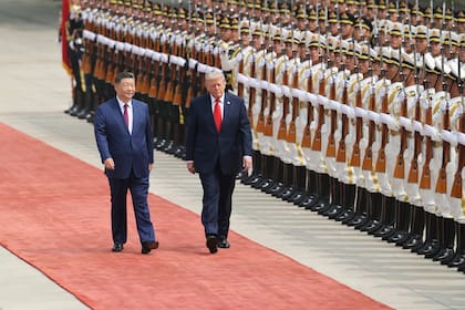 Xi Jinping y Donald Trump, en la recepción al presidente norteamericano en Pekín.