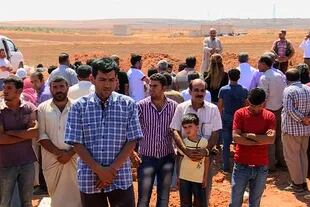 Desolación y dolor en el entierro de Aylan Kurdi, su hermanito y su mamá
