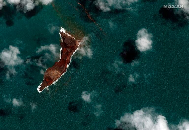 In this satellite image provided by Maxar Technologies, a view of the Hunga Tonga Hunga Ha'apai volcano in Tonga, Tuesday, Jan. 18, 2022, following a massive underwater volcanic eruption.  (Satellite image ©2022 Maxar Technologies via AP)