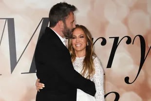 US actress Jennifer Lopez and actor Ben Affleck arrive for a special screening of "Marry Me" at the Directors Guild of America (DGA) in Los Angeles, February 8, 2022. VALERIE MACON / AFP